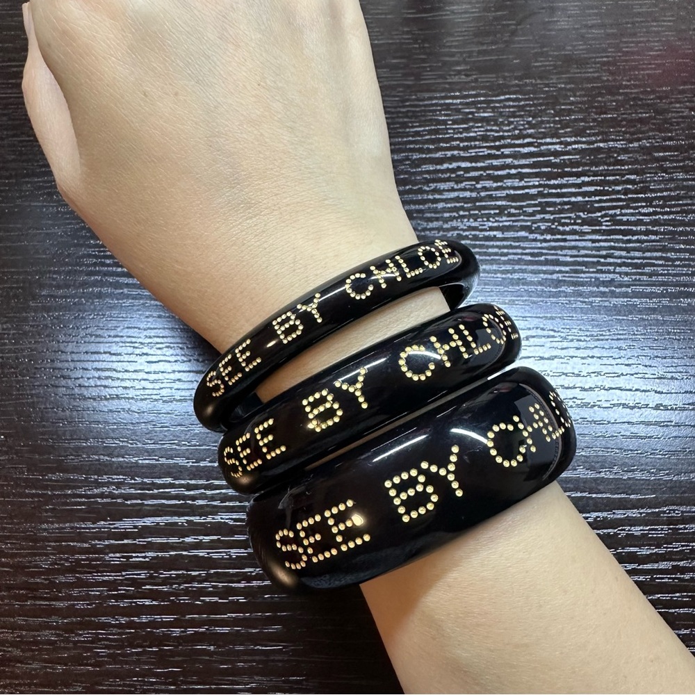 SEE BY CHLOE set of three black bangles